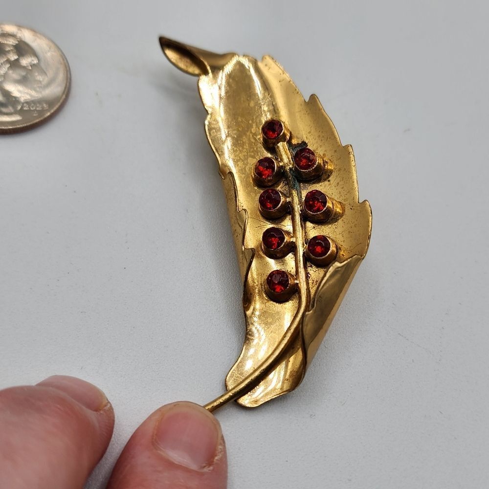 Vintage gold leaf red rhinestone brooch